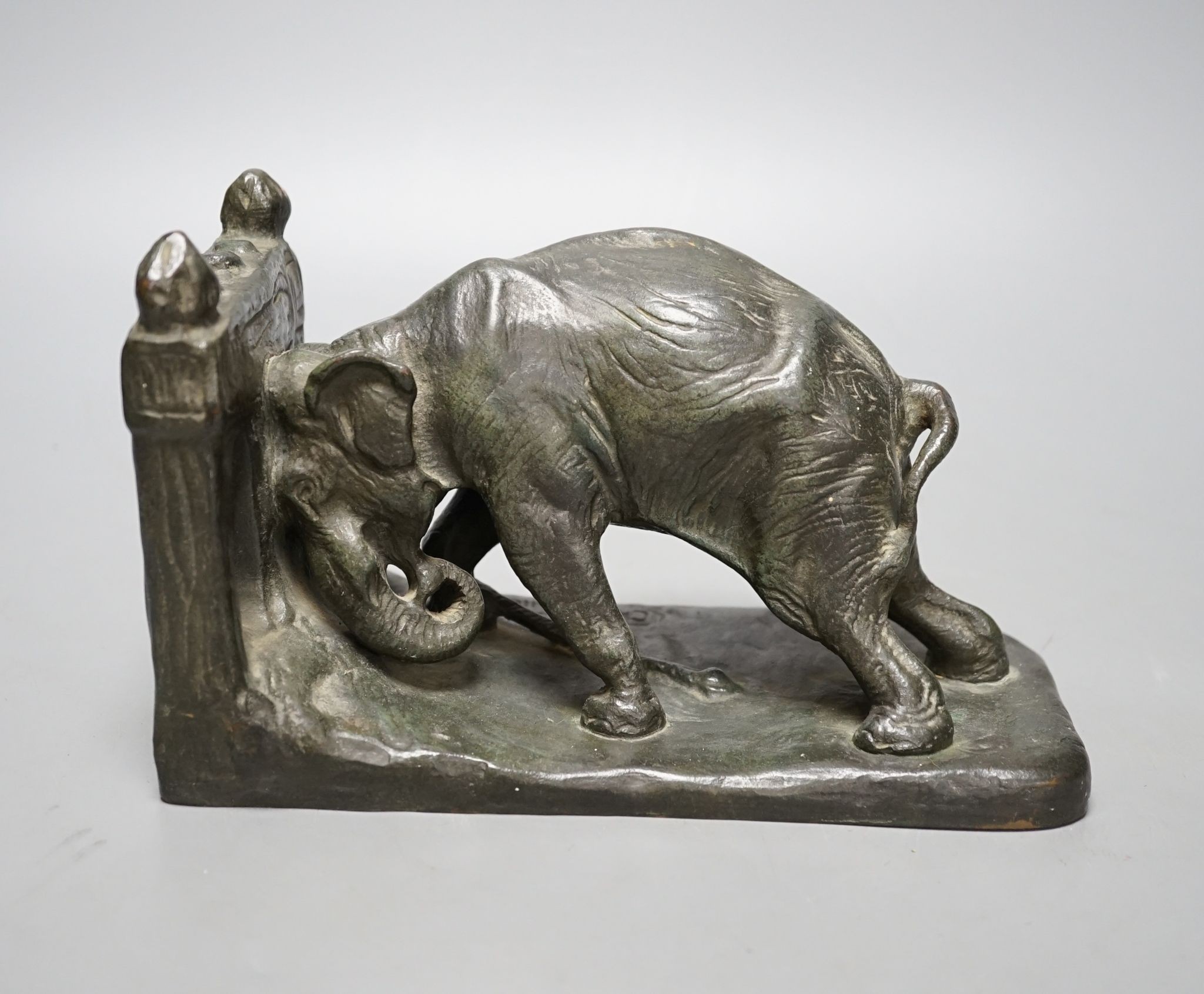 Charles R Knight, a bronze single bookend modelled as an elephant, 21cm
